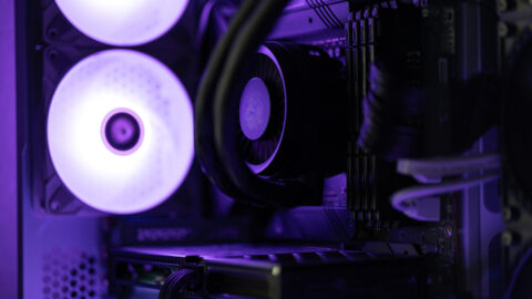 Close up of liquid cooler inside a computer case.